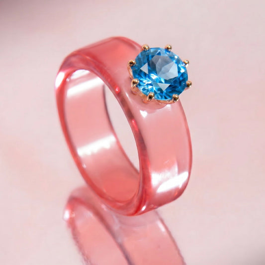 Anillo CG de topacio Swiss Blue y resina salmón