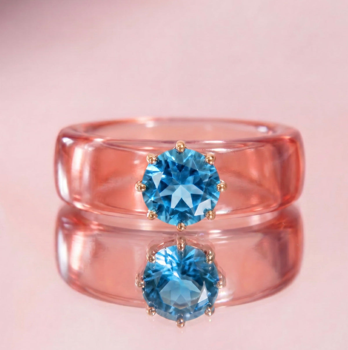 Anillo CG de topacio Swiss Blue y resina salmón, vista trasera