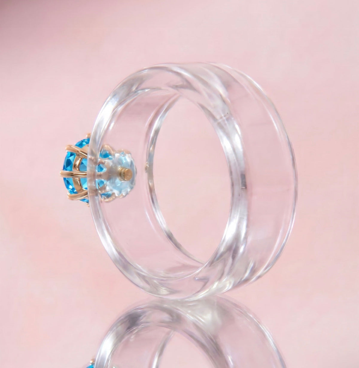 Anillo CG de topacio Swiss Blue y resina transparente, toma vertical